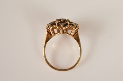 Lot 33 - A 9ct gold garnet flower cluster dress ring