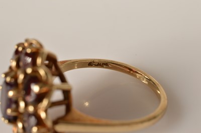 Lot 33 - A 9ct gold garnet flower cluster dress ring