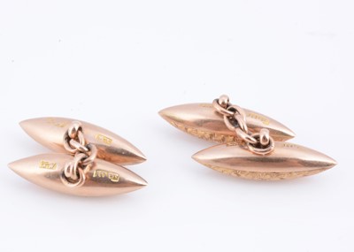 Lot 54 - A pair of 10ct gold Edwardian torpedo engraved cufflinks