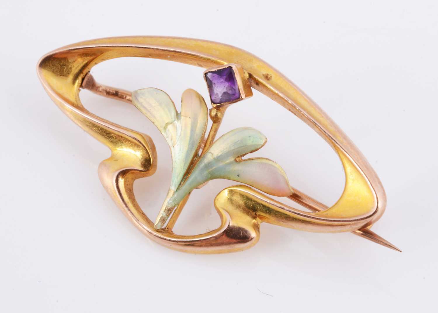 Lot 71 - An Art Nouveau 9ct gold enamel brooch