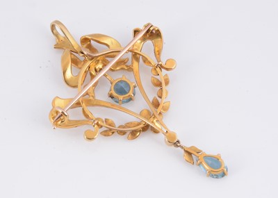 Lot 92 - An Edwardian seed pearl & aquamarine brooch pendant
