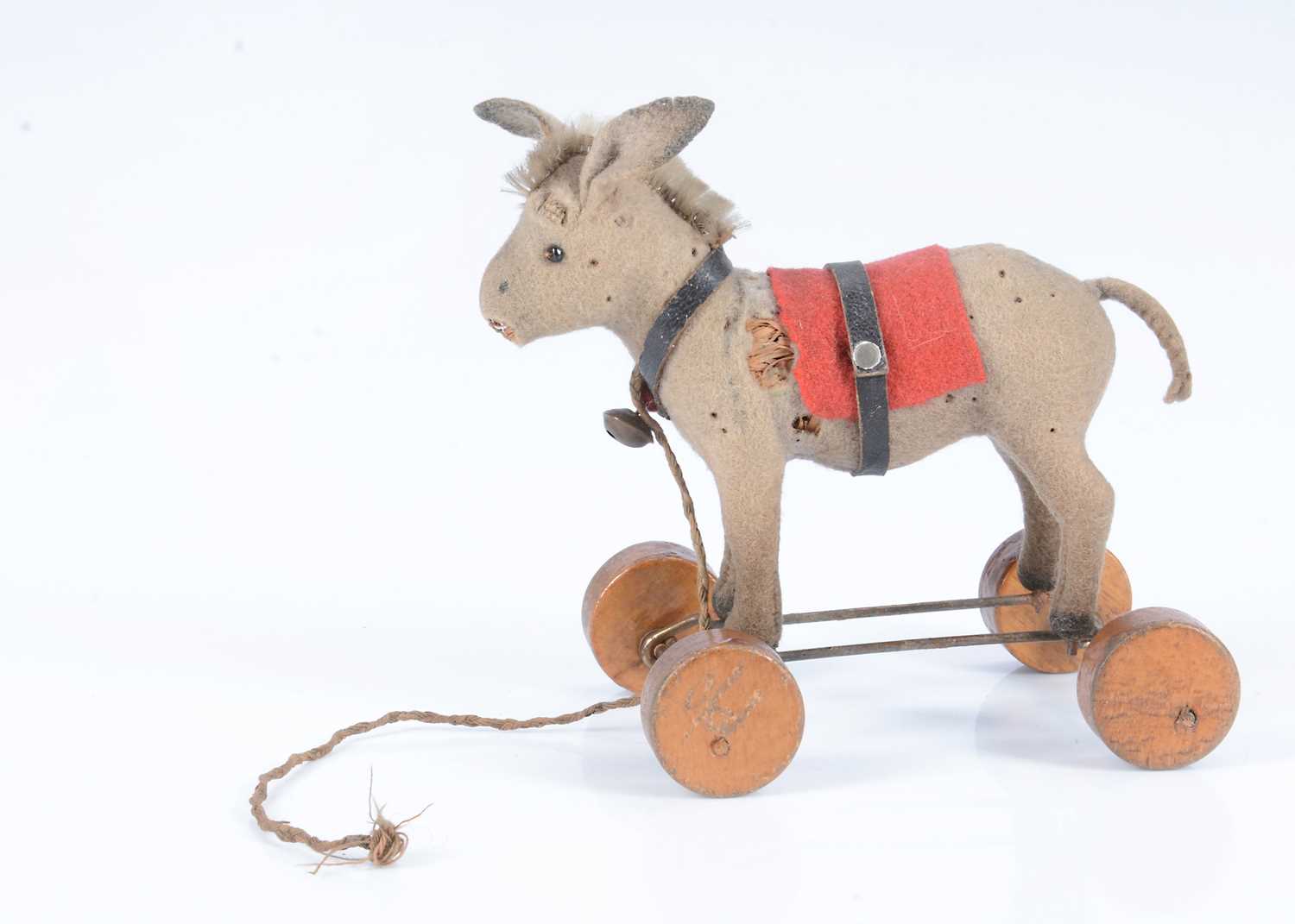 Lot 17 - A rare small Steiff pull-along donkey, circa 1920