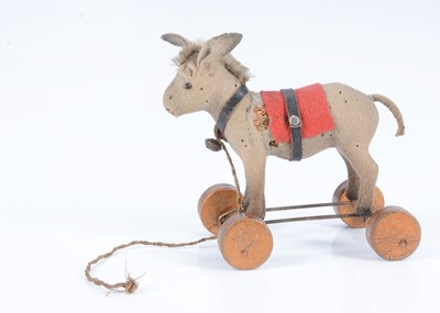 Lot 17 - A rare small Steiff pull-along donkey, circa 1920