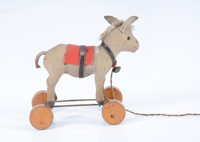 Lot 17 - A rare small Steiff pull-along donkey, circa 1920