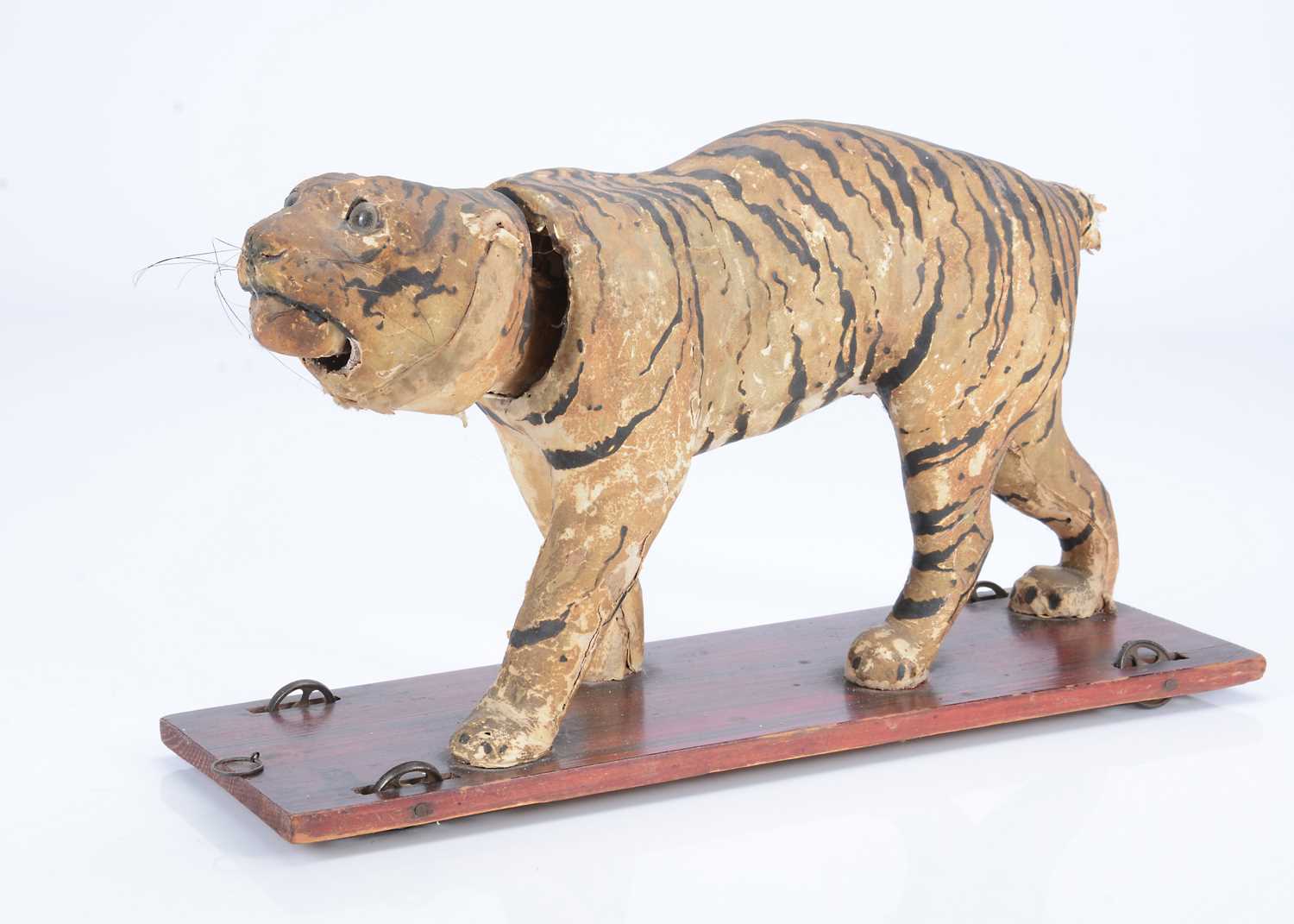 Lot 29 - An 19th century skin covered nodding tiger on wheels
