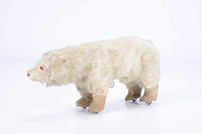 Lot 30 - A late 19th century fur polar bear on wheels