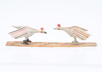Lot 35 - A late 19th century Erzgebirge wooden pair of fighting cocks