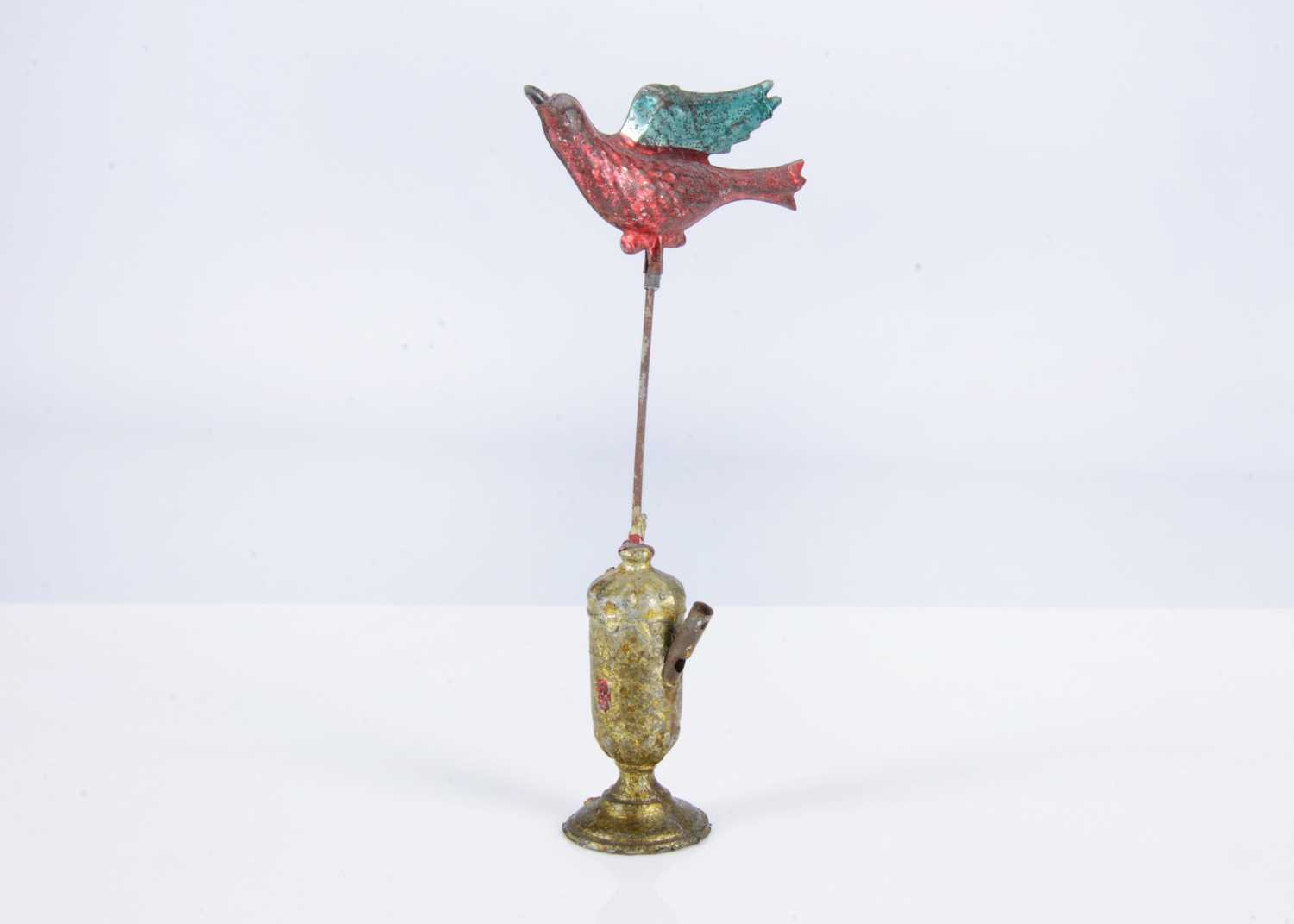 Lot 36 - A late 19th century lead and tinplate bird whistle