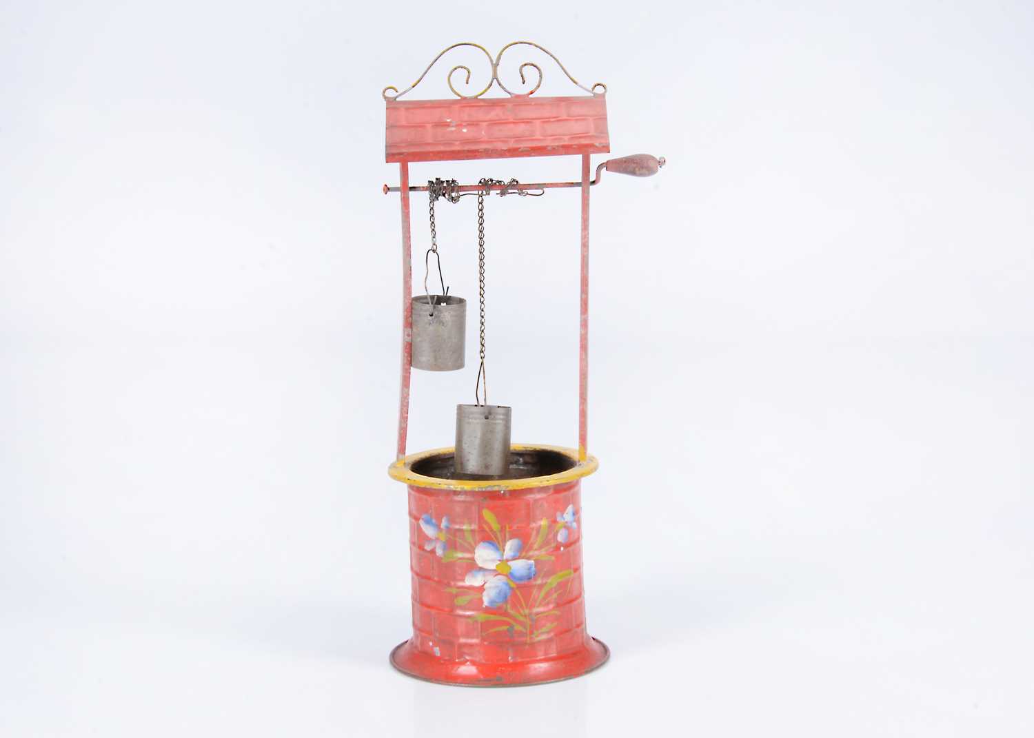 Lot 39 - A German painted tinplate well, circa 1900