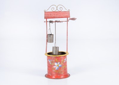 Lot 39 - A German painted tinplate well, circa 1900
