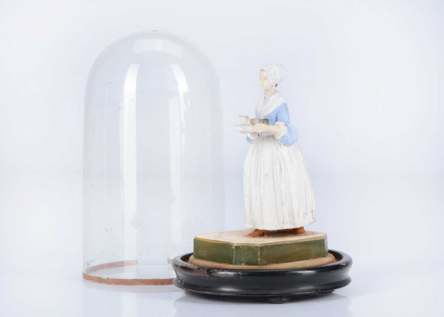 Lot 40 - An 19th century German figure of The Chocolate Girl after the painting by Jean-Etienne Liotard