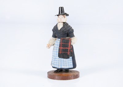 Lot 41 - An 19th century German composition figure of a Welsh woman container