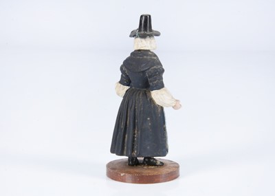Lot 41 - An 19th century German composition figure of a Welsh woman container