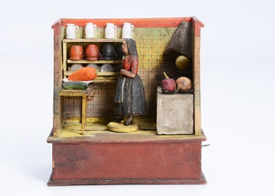 Lot 43 - A mid 19th century Thüringen composition and wood kitchen mechanical toy