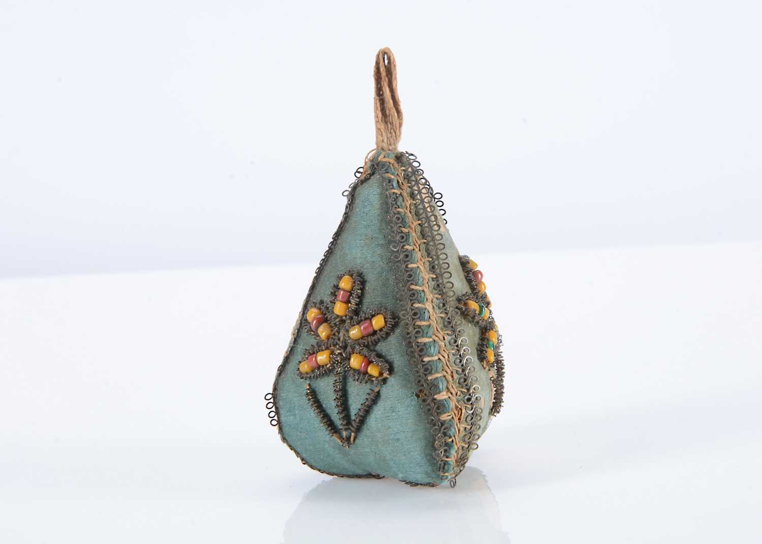 Lot 47 - An 18th century pear shaped pin cushion