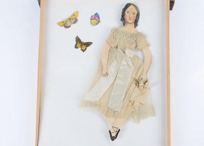 Lot 49 - A mid 19th century hand-painted and cut articulated paper doll