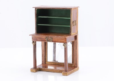 Lot 54 - An early 19th century French card dolls’ house Bonheur du Jour with shop stamp