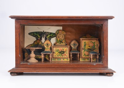 Lot 55 - A late 19th century German chromolithographic paper covered dolls’ house set with insects