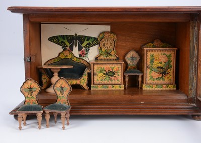 Lot 55 - A late 19th century German chromolithographic paper covered dolls’ house set with insects