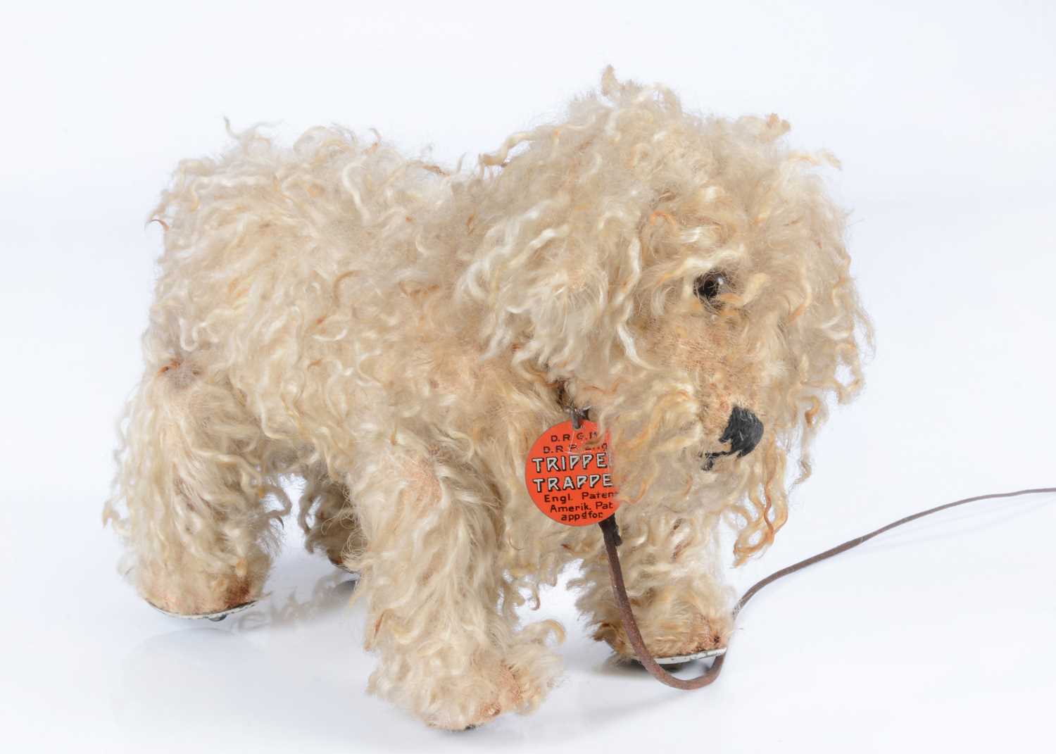 Lot 58 - A rare Bing Tripple-Trappel walking poodle, 1908 -1912