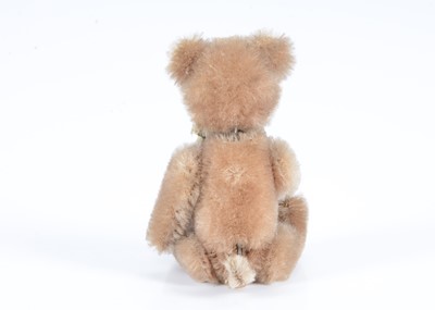 Lot 73 - A small post-war Schuco yes/no teddy bear