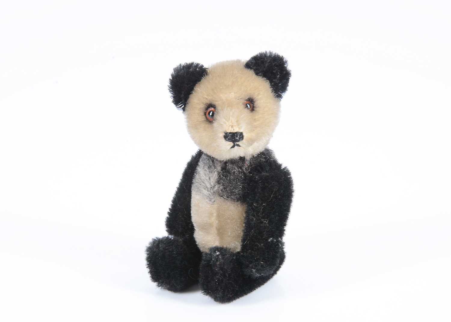 Lot 74 - A small post-war Schuco yes/no panda bear
