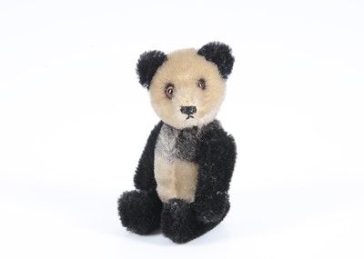 Lot 74 - A small post-war Schuco yes/no panda bear