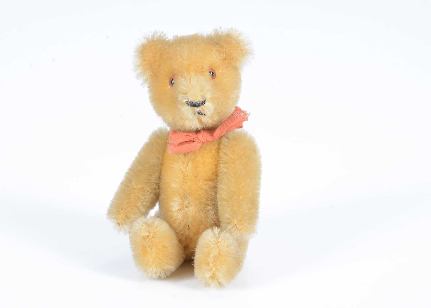 Lot 75 - A small post-war Schuco yes/no teddy bear