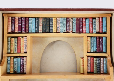 Lot 94 - A rare early 20th century British game ‘The Free Library - complete with Miniature Bookcase & Books’