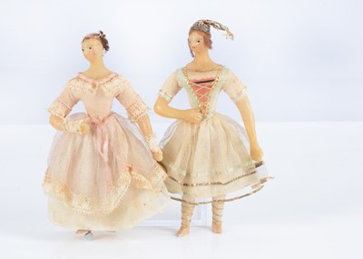 Lot 97 - Two rare mid 19th century poured wax dolls’ house size ballet dancing dolls