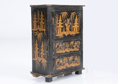 Lot 101 - A rare German regency lacquered card Chinoiserie dolls’ house set