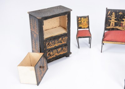 Lot 101 - A rare German regency lacquered card Chinoiserie dolls’ house set