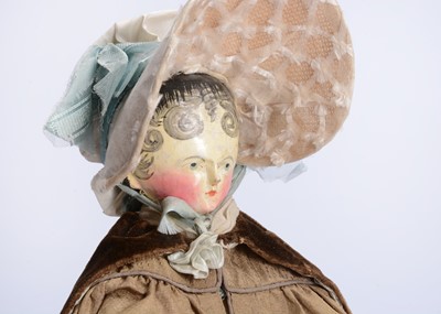 Lot 104 - A fine and large 19th century Grodnertal carved wooden doll with comb tuck