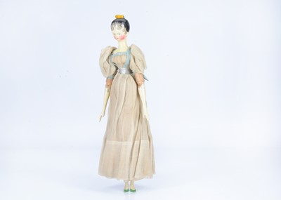 Lot 104 - A fine and large 19th century Grodnertal carved wooden doll with comb tuck