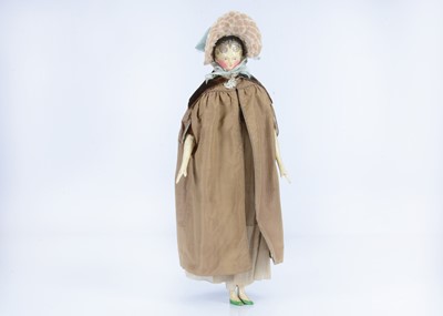 Lot 104 - A fine and large 19th century Grodnertal carved wooden doll with comb tuck