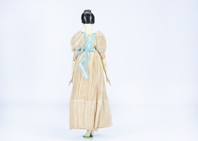 Lot 104 - A fine and large 19th century Grodnertal carved wooden doll with comb tuck