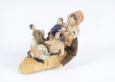 Lot 113 - A rare 19th century Grodnertal wooden doll ‘Old Lady who Lived in a Shoe’
