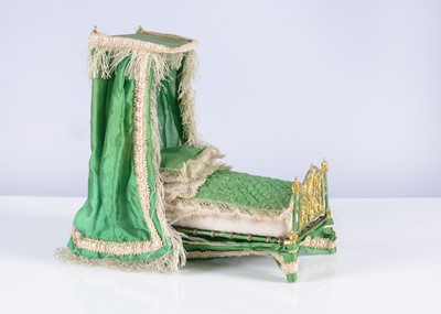 Lot 116 - A fine 19th century soft metal dolls’ house half-tester bed