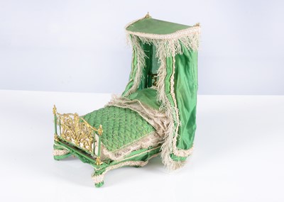 Lot 116 - A fine 19th century soft metal dolls’ house half-tester bed
