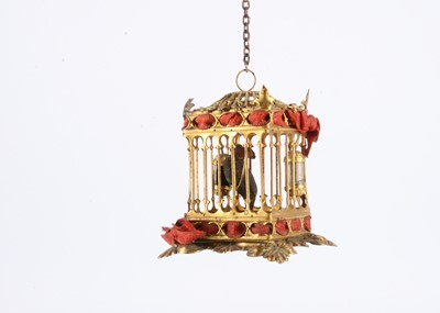 Lot 121 - A late 19th century German gilt metal dolls’ house parrot cage