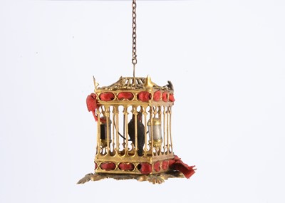 Lot 121 - A late 19th century German gilt metal dolls’ house parrot cage