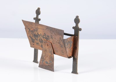 Lot 122 - An early English brass dolls’ house fire grate