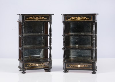 Lot 123 - A pair of 19th century Waltershausen ebonised dolls’ house open display shelves