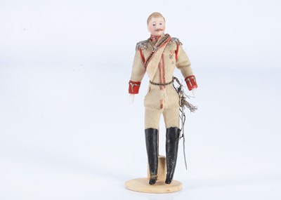Lot 124 - A fine German bisque shoulder-head dolls’ house soldier doll