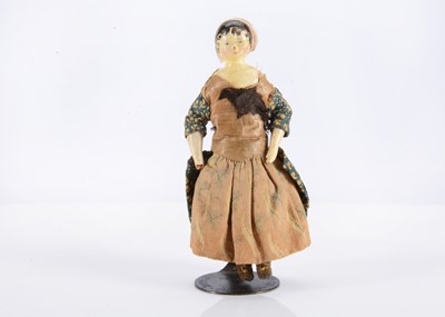 Lot 126 - An 19th century Grodnertal wooden dolls’ house doll