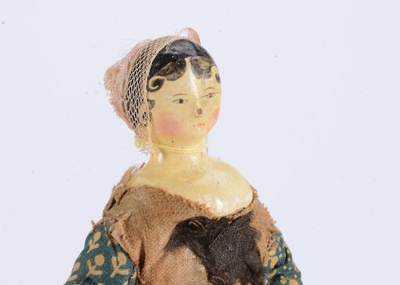 Lot 126 - An 19th century Grodnertal wooden dolls’ house doll
