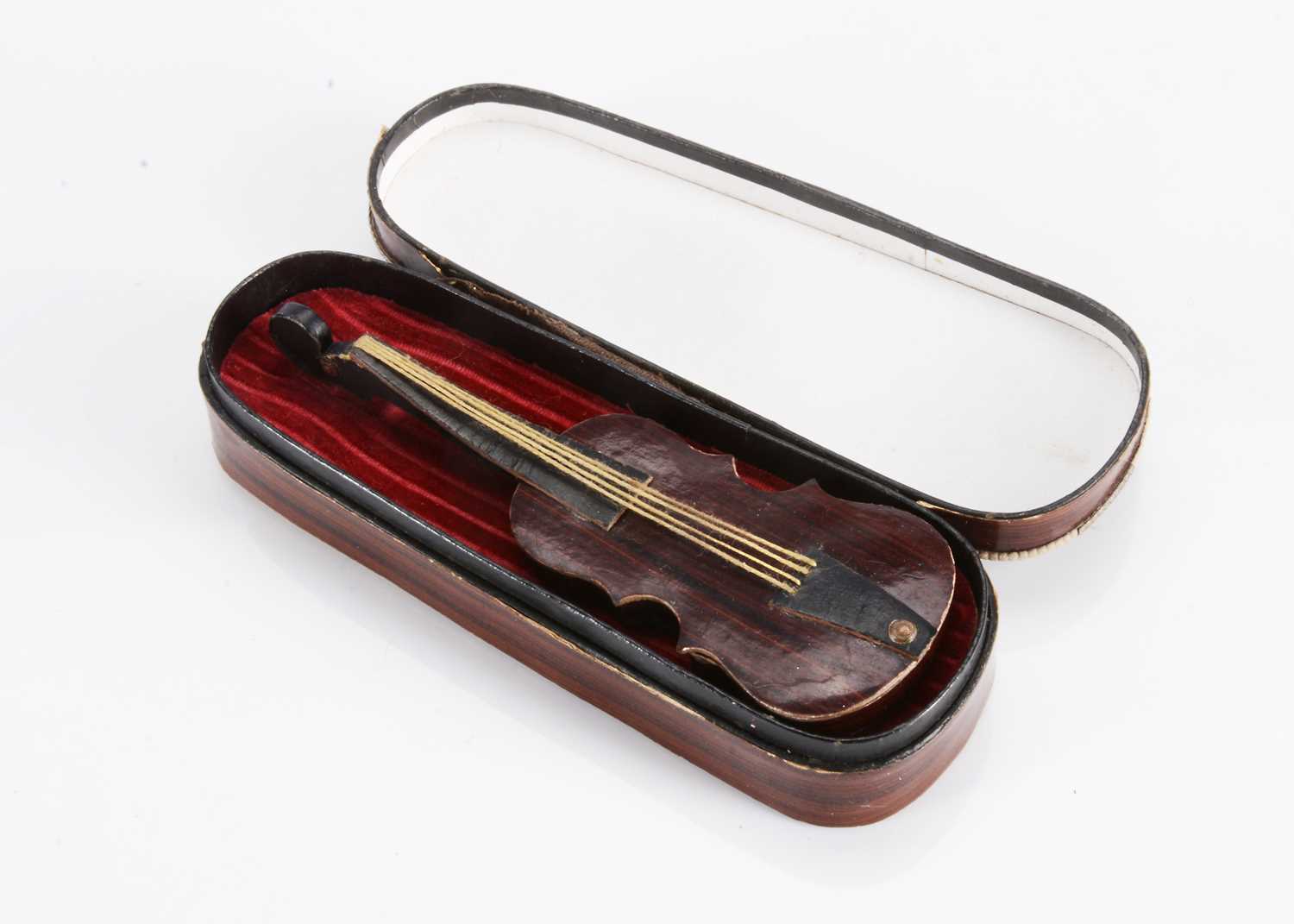 Lot 127 - An 19th century doll’s or dolls’ house violin and case sweet box (candy container)