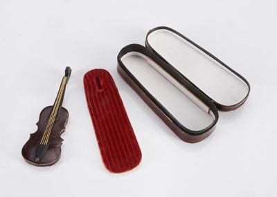 Lot 127 - An 19th century doll’s or dolls’ house violin and case sweet box (candy container)
