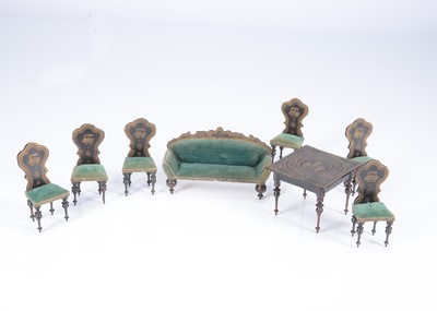 Lot 131 - A late 19th century Waltershausen ebonised dolls’ house set