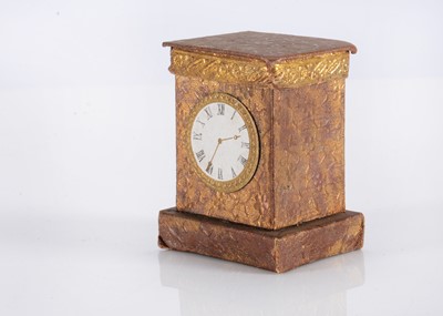 Lot 134 - An 19th century gilt card dolls’ house mantel clock sweet box (candy container)